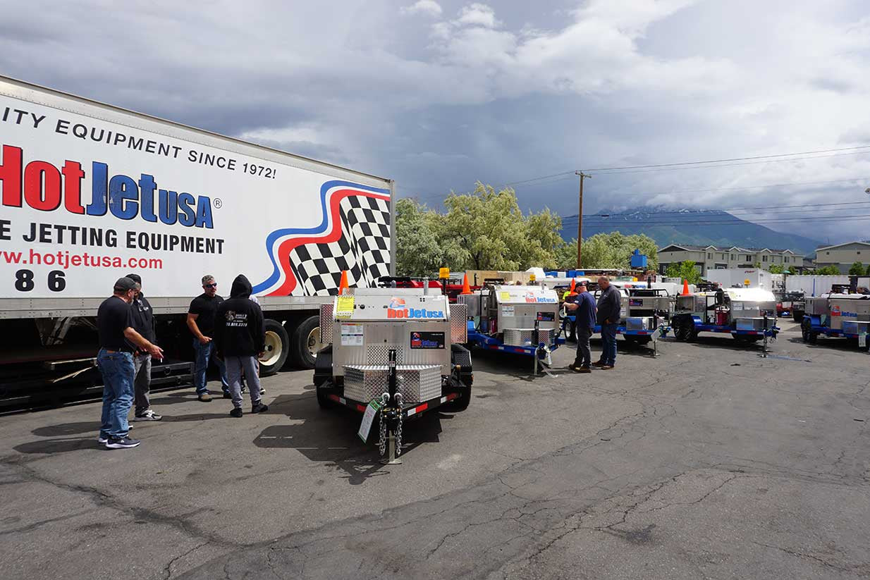 People and trailer jetters at HotJet USA's June 2023 training event in Riverton, Utah